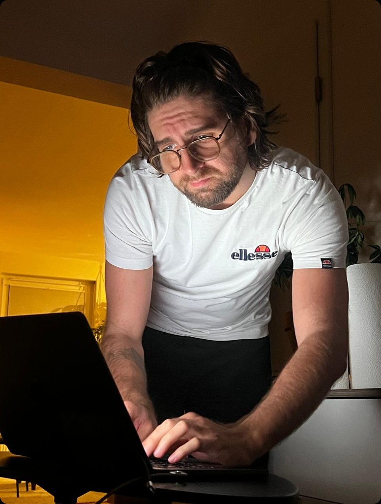 Jan Brombach working at a laptop